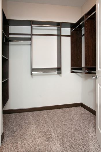 Large Closets with California Closets installations at Victoria Flats, Victoria, 55386